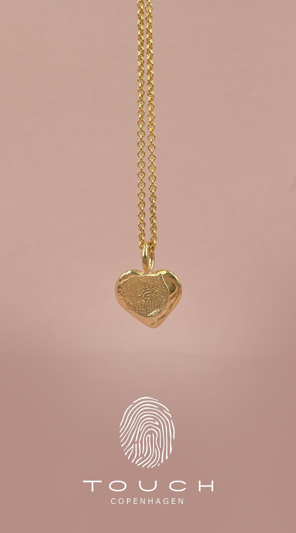 Big Mila forgyldt sølvvedhæng i hjerte form med fingeraftryk fra touch copenhagen